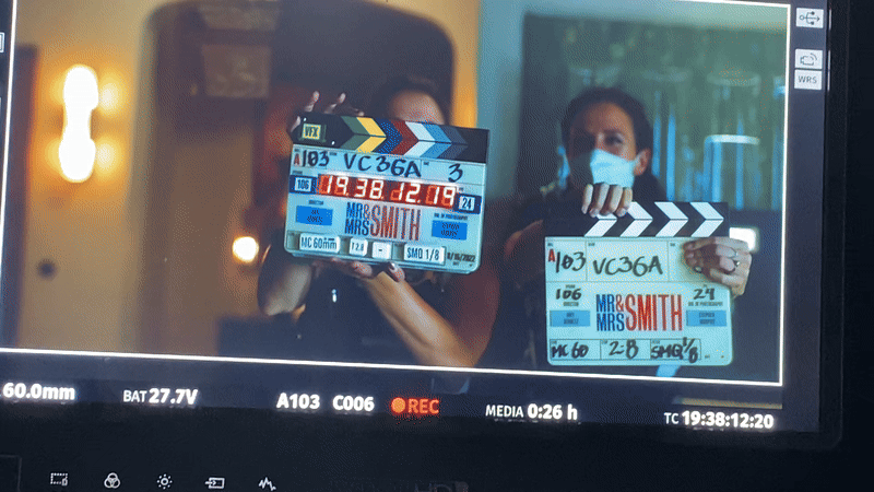 Animert GIF som viser en film-klappebrett med tekst som indikerer start på filming